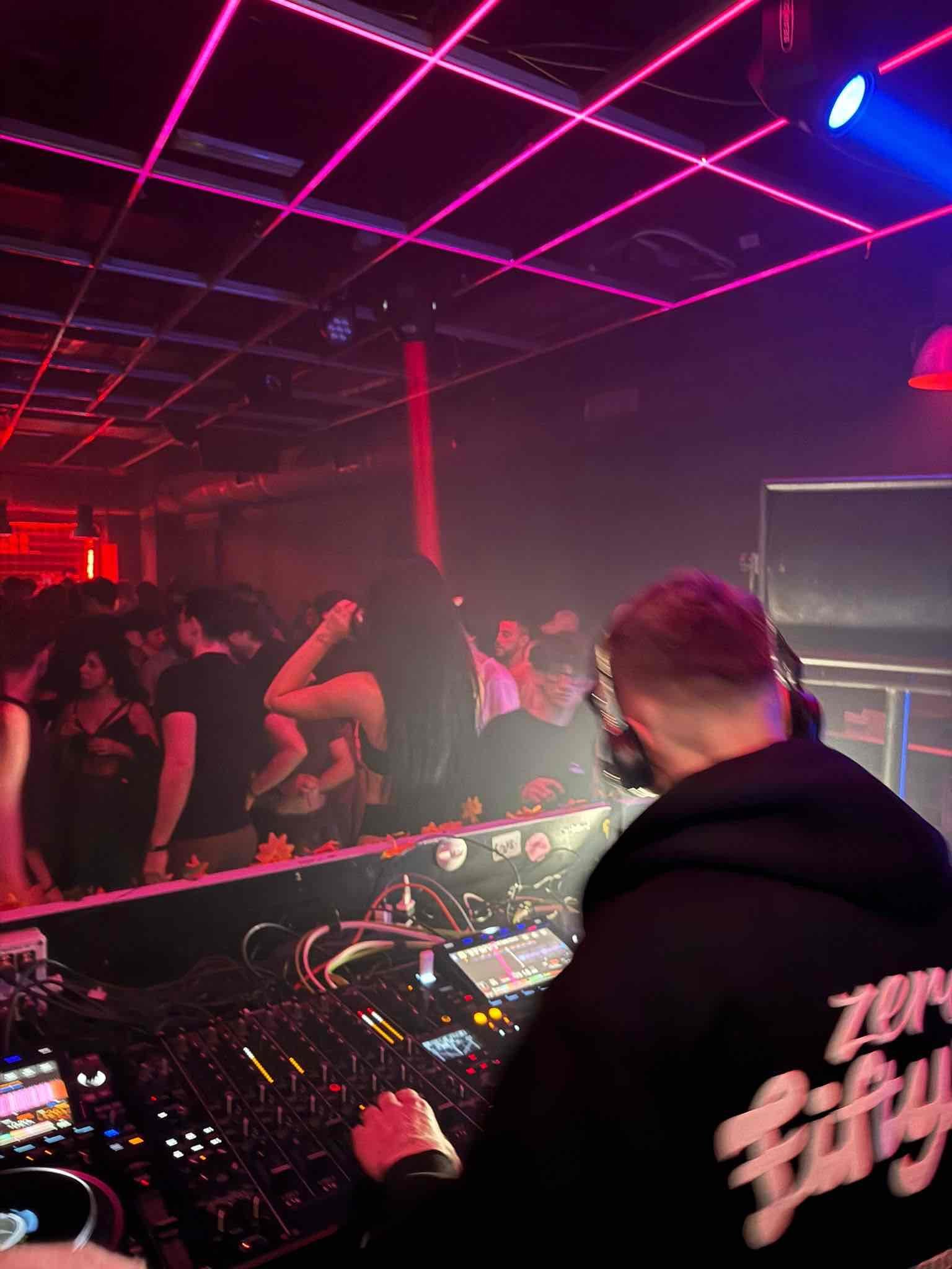 Neon grid ceiling at club event